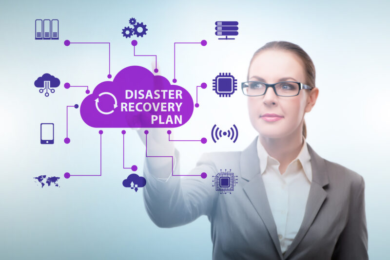 woman pointing and showing disaster recovery plan