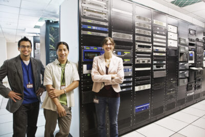 young team of engineers working in a colocation data center 