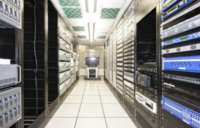 colocation data center and storage racks in server room 